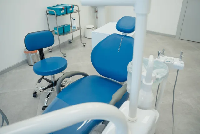 A clean and modern dental clinic featuring blue chairs and essential dental equipment. Dental reputation management benchmarks: the numbers and what sits behind them
