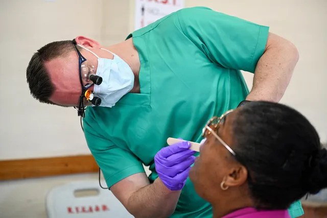 U.S. Air Force Reserve Maj. Nate Criddle, 926th Aerospace Medicine Squadron dentist, examines a Kittitian patient’s teeth at the K. Earle Clarke Community Center in Basseterre, Saint Kitts, March 3, 2026. The dental examination took place during the Lesser Antilles Medical Assistance Team 2026 healt. Twelve dental reputation management mistakes and the controls to use instead