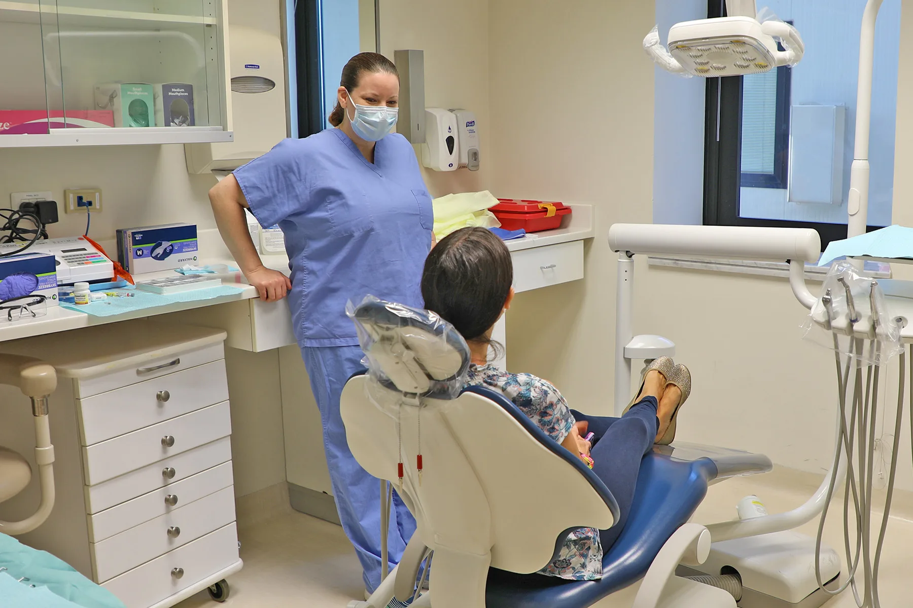 NAS SIGONELLA, Italy-- Tech. Sgt. Sara Cookson, a dental technician with the 127th Medical Group, Selfridge Air National Guard Base, Michigan, discusses a routine dental appointment with a patient here on September 15, 2021. Michigan National Guard members of the 127th Medical Group and 110th Medica. How Zocdoc and Opencare Send Dental Patients Differently
